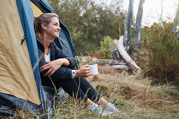 Image showing Camp, woman and coffee in tent, smile and outdoor to enjoy nature, freedom and fresh air. Female, girl and camping drink tea in morning, at campsite and happy with wellness, healthy and natural view.