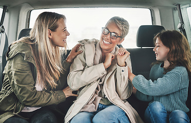 Image showing Playful, mother and children on a road trip in a car for travel, adventure and holiday together. Grandmother, mom and girl kid playing, bonding and happy with a smile on vacation with transportation