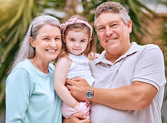 Image showing Garden, family and grandparents portrait with young child smile for bond, care and happiness together. Happy, senior and grandmother with grandpa holding girl in Australia for retirement leisure.