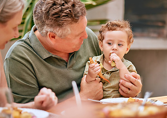 Image showing Family, lunch and grandparents have food with child at home for happy bonding meal together. Senior grandmother, grandpa and young kid at family home eating at dining table in summer.