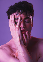 Image showing Face, honey and man in studio for skincare, beauty and organic products for facial. Natural beauty products, skincare products and young male model with dripping syrup on hands on purple background