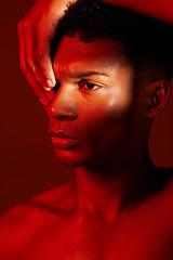 Image showing Red beauty, light and face of model with creative shadow design, artistic neon lighting and luxury skincare. Sweat, hard work and aesthetic creativity of serious black man isolated on red background