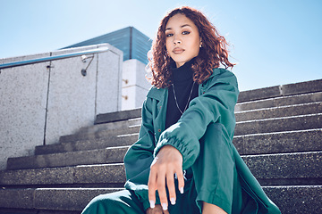 Image showing Fashion, travel and woman student on building steps in a city, with vision for mission, goal and mindset. Portrait, girl and exchange student on a solo trip in New York, proud and confident downtown