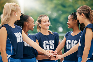 Image showing Netball team, hands and women sports motivation of athlete group showing happy teamwork support. Female exercise group with diversity and smile ready for a training match outdoor with happiness