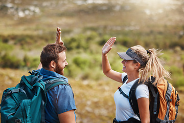 Image showing High five, success and couple hiking in nature with motivation, goal and support in Puerto Rico. Teamwork, celebration and man and woman excited about travel adventure on a mountain for holiday