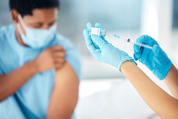 Image showing Doctor hands giving covid vaccine injection to patient for healthcare safety, medical service and bacteria risk protection in clinic. Nurse prepare syringe, vial and corona virus flu shot medicine