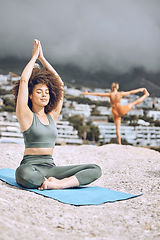 Image showing Zen, yoga exercise and woman on beach for wellness meditation or mental health. Young athlete fitness girl, relax motivation workout or healthy lifestyle chakra energy training on nature rock outside