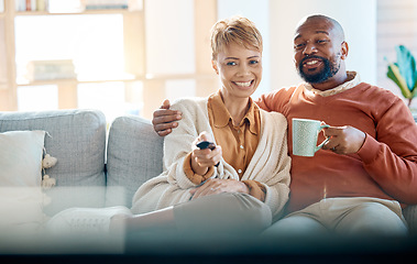 Image showing Watching tv, home and couple relax together on sofa or home living room for online show, movie or comedy. Love, care and black woman, man or happy people streaming film on television for quality time