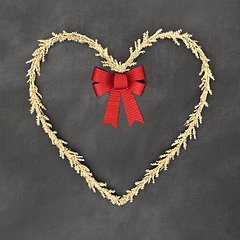 Image showing Christmas Tinsel Heart Shape Wreath and Red Bow  