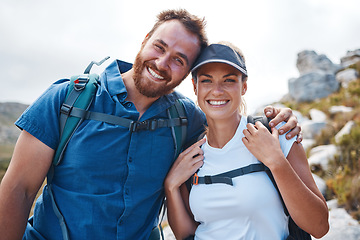 Image showing Hiking, fitness and love with a couple in the mountains for exercise, adventure or cardio during the day. Nature, health and training with a man and woman walking outdoor on a mountain trail together