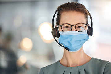 Image showing Call center, covid and portrait of woman in mask with headset for consulting in office. Crm, covid 19 compliance and mature sales agent or customer service worker in workplace following health rules.