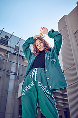 Image showing City, urban fashion and gen z black woman in streetwear with buildings in background. Cool hip hop street style, portrait of girl from Brazil with freedom and youth on summer weekend fun in Sao Paulo