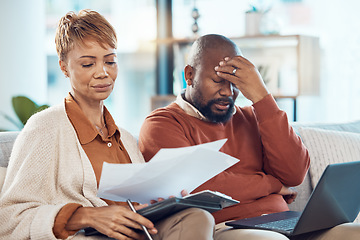 Image showing Black couple, stress and laptop in finance debt, expenses or mortgage bills together on the living room sofa at home. Man and woman suffering in financial pressure, payments or issues on computer
