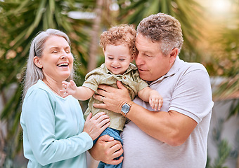 Image showing Family, children and grandparents bonding in the garden of their home with love, care and trust. Kids, retirement and smile with a happy senior man, woman and their grandson in the backyard together