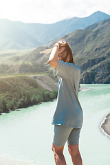 Image showing woman on the confluence of two rivers Katun and Chuya in Altai mountains, beauty summer day