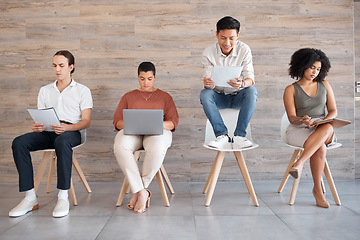 Image showing Interview, recruitment and hiring with an applicant group waiting in line for a meeting with human resources. Diversity, resume and opportunity with business man and woman staff sitting in a row