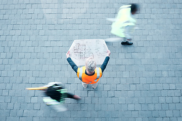 Image showing Civil engineering, blueprint and architect man outdoor busy planning infrastructure, floor plan and building development job. Construction worker people walking for project productivity goal above