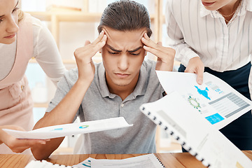 Image showing Stress, headache and overwhelmed worker with burnout handed office paperwork by manager and employees. Mental health, anxiety and tired worker stressed or frustrated with note report review deadline