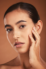 Image showing Skincare, young girl and face with cosmetics, confident and healthy organic facial with brown studio background. Portrait, makeup and girl with pride, natural beauty for smooth skin and wellness.