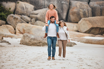 Image showing Family, beach and travel with child, mom and dad walking together for adventure, vacation and bonding time in nature. Man and woman parents with girl by sea for happiness, fitness and outdoor fun