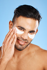 Image showing Man, eye care and cotton patch for skincare, organic facial or wellness for health, body care or clear skin. Portrait, Indian male or natural beauty for anti wrinkle, remove dark circles or face glow