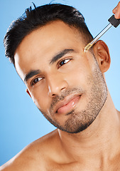 Image showing Face serum, model and skincare of a man from Spain with perfect skin wellness and care. Beauty, cosmetic and smooth facial product oil of a person healthy with lotion, moisturiser and glow treatment