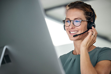 Image showing Customer service, woman and happy call center agent giving advice online using a headset. Operator, telemarketing and support with hotline consultant working for contact us help or arm consulting