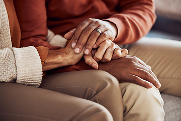 Image showing Mature couple, bonding and holding hands in support, trust or security in house, home or marriage counseling sofa. Zoom, black woman or man in counselling therapy for mental health, anxiety or stress