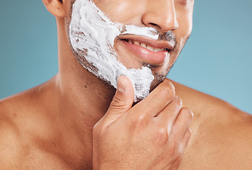 Image showing Shaving cream, cleaning and foam with man for beauty, health and wellness mockup on blue studio background. Male happy about skincare facial for clean and healthy skin with hair removal and self care