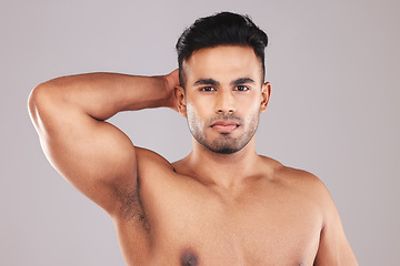 Image showing Man, beauty skincare and healthy cosmetic bodycare grooming. Portrait of young male flexing, facial and skin dermatology wellness lifestyle for mental health wellbeing in gray background studio