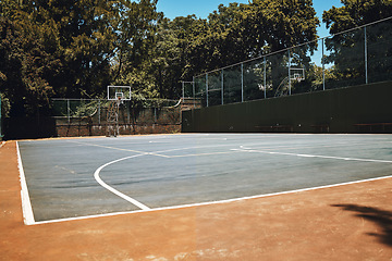 Image showing Sports, basketball court and nature, outdoor park and space for youth to exercise, workout and play in summer. Basketball, fitness and health, playground with trees and motivation for playing game.