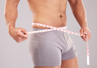 Image showing Diet, weightloss and body of model with tape measure to track fitness, slimming or exercise training results. Health goals, wellness motivation and man measure stomach waist to check workout progress