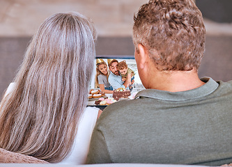 Image showing Video call and senior couple celebrating grandchild birthday on a virtual call online. Mature man and woman celebrate family birthday party with video conference at home for happy birthday