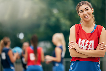 Image showing Proud, sports and netball woman in portrait smile for success, training motivation and outdoor wellness challenge with team. Young, happy and healthy fitness teenager in game or competition on court