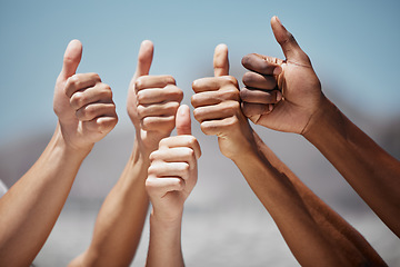 Image showing Thumbs up, hands and community fo people, friends or team together for motivation, thank you and support for vote outdoor. Group of men and women together for yes sign review for teamwork and success