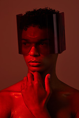 Image showing man, face and red light with futuristic glasses for edgy cyberpunk fashion, modern gen z fantasy and sci fi model for beauty. Young black man, vision thinking or designer neon lighting studio