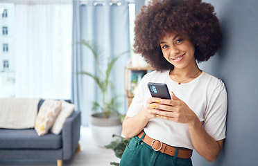 Image showing Portrait, woman and phone for social media, afro and happy with online app, web and text contact in home. Beauty, afro and fashion female with 5g mobile smartphone with internet content in the lounge