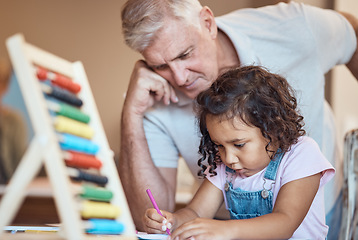 Image showing child, learning and father teaching with abacus together for development. Elderly man, grandparent or teacher with young student girl writing in book for education or study skills activity at home