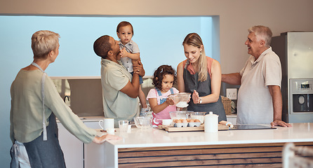 Image showing Big family, cooking and baking in home kitchen for bonding, learning and help while making food and teaching skills with children, parents and grandparents. Men, women and children together to bake