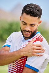 Image showing Sports, football and man with shoulder pain, injury or training accident from competition, exercise or fitness workout. Game emergency, muscle problem and athlete soccer player hurt on soccer field