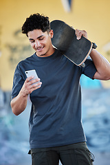 Image showing Young man with skateboard in city, smartphone communication with social media and urban street fashion in Mexico. Laughing at online meme, 5g digital network and guy checking mobile in skate park