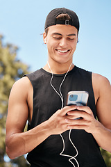 Image showing Fitness, phone and man on social media for a meme, internet entertainment or trending online content outdoors. Smile, happy and healthy athlete texting, posting or typing a funny message on cool app