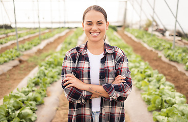 Image showing Agriculture, farming and woman farmer in a greenhouse with sustainable plants and pride for growth and development of eco environment. Portrait of female on a farm in countryside for sustainability