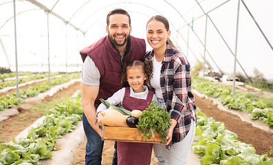 Image showing Family, vegetables and greenhouse for eco friendly farming, smile or organic produce for fresh items and happy. Agriculture, farmer and parents with kid, garden for healthy food, nutrition or harvest
