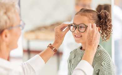 Image showing Vision, eye care glasses and child with optometrist for ophthalmology consultation, help or support with eyesight. Healthcare service, optical check and expert consulting youth patient at eye exam