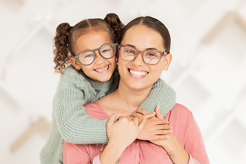 Image showing Eye care, glasses and child hug mother with new vision lens, prescription eyeglasses or ocular support spectacles. Eyesight, healthcare service and portrait of happy family at optometry retail store