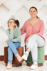 Image showing Glasses, portrait and mother with her child at an eye clinic retail store for healthy vision and eyes wellness. Happy customer, mom and young girl enjoys shopping for quality eye care with insurance