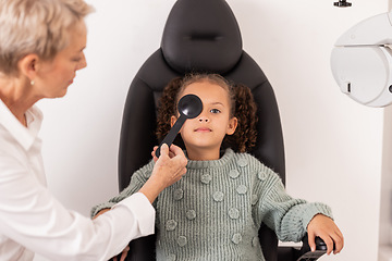 Image showing Eye exam, child and optometrist testing eye sight for glasses, blindness and new lense. Vision test, blind girl and kid in chair of professional ophthalmologist, corrective lenses and optician office