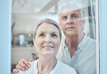 Image showing Family, couple and senior people at a window for looking, talking and embrace, happy and smile in their home. Glass, happy family and proud seniors bond, relax and discuss the view from their house