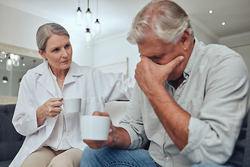 Image showing Coffee, depression and support with a senior man talking to a doctor while on a sofa together. Cancer, sad and mental health with a mature patient and woman showing compassion in a retirement home